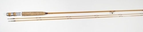 A fine H.L. Leonard "Leonard model 38" 2 piece (2 tips) cane brook trout fly rod, 7', #4, light tan/crimson tipped silk wraps, wooden reel seat with alloy screw grip fitting, nickel silver suction ferrule, no. 3206, only very light use, in bag and leathe