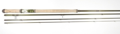 A Loomis "Stinger GLX" 4 piece carbon salmon fly rod, 13'6", 36g, green silk wraps, anodised screw grip reel fitting, ivorine reel seat with fly motif, light use only, in cordura tube