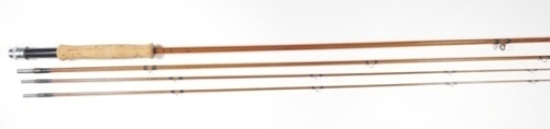 A Hardy "LRH Dry/Wet" 3 piece (2 tips) cane trout fly rod, 9'3", green/crimson tipped silk wraps, alloy screw grip reel fitting, suction joints, 1953, slight crazing to some varnish otherwise good condition, in bag