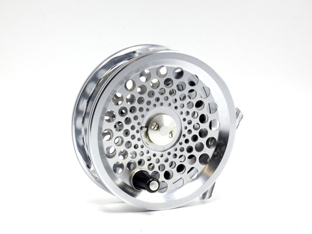 A Shakespeare International 2853 magnesium fly reel, composition 