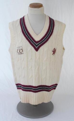 Ian Botham. Somerset Ist XI sleeveless sweater and short sleeve shirt issued to and worn by Botham in his playing career.