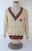 Ian Botham. Somerset Ist XI long sleeve sweater issued to and worn by Botham in his playing career. The cream woollen sweater by ‘Morrant Sports’ with county colours of maroon, grey and black to neck and waist and emblem of maroon dragon and red tongue. V