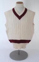 Ian Botham. Queensland Ist XI sleeveless sweater issued to and worn by Botham in his playing career. The woollen sweater by ‘Sovrano’ with county colours of maroon to neck and waist. Very good condition.