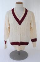 Ian Botham. Queensland Ist XI long sleeve sweater issued to and worn by Botham in his playing career. The woollen sweater by ‘Kent & Curwen’ with county colours of maroon to neck, waist and cuffs. Very good condition.