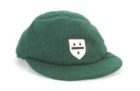 Ian Botham. Worcestershire 1st XI cricket cap worn by Botham during his playing career with the county. The green cloth cap, by Foster of London, with the Worcestershire emblem of the three pears embroidered in white and black in shield to the front. The 