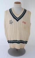 Ian Botham. Worcestershire 1st XI sleeveless sweater issued to and worn by Botham. The woollen sweater by ‘Duncan Fearnley’ with county colours of green, white and black to neck and waist, county ‘three black pears’ and ‘MEB’ sponsor’s emblems to chest. V