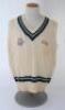 Ian Botham. Worcestershire 1st XI sleeveless sweater issued to and worn by Botham. The woollen sweater by ‘Duncan Fearnley’ with county colours of green, white and black to neck and waist, county ‘three black pears’ and ‘MEB’ sponsor’s emblems to chest. V