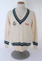 Ian Botham. Worcestershire 1st XI long sleeve sweater issued to and worn by Botham. The woollen sweater by ‘Duncan Fearnley’ with county colours of green, white and black to neck, waist and cuffs, county ‘three black pears’ and ‘MEB’ sponsor’s emblems to 