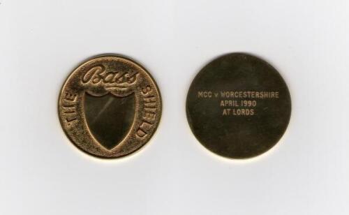 Ian Botham. M.C.C. v Worcestershire, Lord&rsquo;s, 17th- 20th April 1990. Circular gold metal medal presented to Botham. &lsquo;The Bass Shield&rsquo; emblem to one side, engraved to the verso &lsquo;MCC v Worcestershire April 1990 at Lord&rsquo;s&rsquo;. 1.75&rdquo; diameter in original presenta