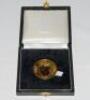 Ian Botham. M.C.C. v Worcestershire, Lord&rsquo;s, 17th- 20th April 1990. Circular gold metal medal presented to Botham. &lsquo;The Bass Shield&rsquo; emblem to one side, engraved to the verso &lsquo;MCC v Worcestershire April 1990 at Lord&rsquo;s&rsquo;. 1.75&rdquo; diameter in original presenta - 2