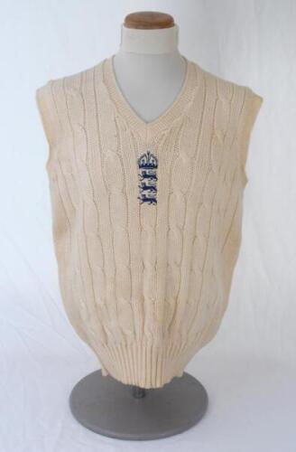 Ian Botham. England 1980s. Original England Test woollen sleeveless sweater worn by Botham during his playing career. The sweater by Kent & Curwen with crown and three lions emblem to chest. Very good condition.