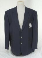 Ian Botham. M.C.C./ England tour blazer issued to and worn by Ian Botham. The undated navy blue blazer by Daks/ Simpsons of Piccadilly with embroidered M.C.C. touring emblem of St George & Dragon to breast pocket. Inside the breast pocket is a small Belve
