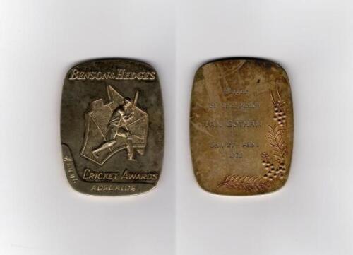 Ian Botham. ‘Benson & Hedges Cricket Awards’. The Ashes 1978/79. Gold metal medal awarded to Ian Botham as ‘Player of the Match’ for the 5th Test at Adelaide, 27th January- 1st February 1979. The rectangular medal with rounded corners and edges measures 