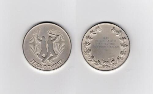 Ian Botham. &lsquo;Texaco Trophy&rsquo; England v Australia 1985. Hallmarked silver &lsquo;Man of the Match&rsquo; medal presented to Botham for the first one day international played at Old Trafford. The medal with relief of batsmen figures to centre and title to lower outer ed