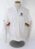Ian Botham. The Ashes. England tour to Australia 1986/87. Original white England tracksuit top with St. George and the Dragon emblem to chest, &lsquo;86 Australia 87&rsquo; below, and stripes in M.C.C. colours to sides. The top by Nike. Worn by Botham during the tour