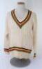 Ian Botham. Tim Hudson&rsquo;s XI (Hudson&rsquo;s Hollywood XI) long sleeve woollen sweater by &lsquo;Hudson&rsquo;s Hardware&rsquo; with team rainbow colours of black, yellow, red and green to neck, waist and cuffs. &lsquo;Botham&rsquo; embroidered to label. Very good condition.
