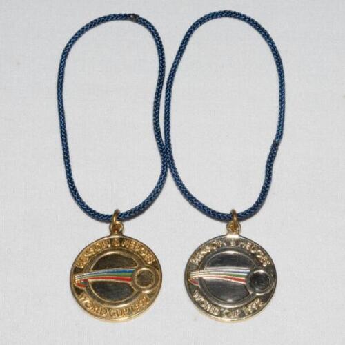 Ian Botham. &lsquo;Benson & Hedges World Cup 1992&rsquo;. Two original gold metal medals presented to Botham for the launch of the 1992 World Cup held in Australia and New Zealand. The medals with colour World Cup emblem to centre. Engraving to verso, &lsquo;Australia, New