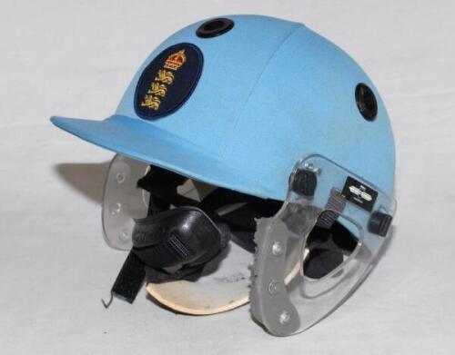 Ian Botham. A light blue one day international batting helmet with clear side visor protection, by Albion C&D Australia, worn by Botham during his playing career. The helmet with embroidered England &lsquo;three lions & crown&rsquo; emblem to front. Lacking one of th