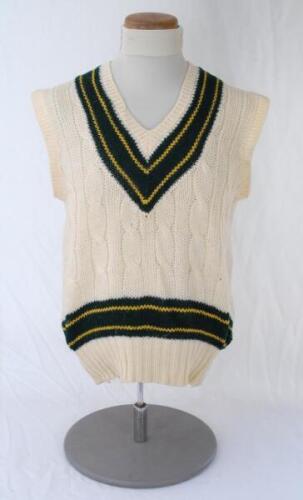 Allan Border. New South Wales & Australia 1976-1996. Original Australia woollen sleeveless sweater worn by Border during his playing career, probably 1980s. The sweater with Australia colours of green and gold to neck and waist, no emblem to chest. Maker 