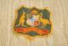 Dennis Lillee. Western Australia & Australia 1969-1988. Original Australia woollen sleeveless sweater worn by Lillee during his playing career, probably 1980s. The sweater with Australia colours of green and gold to neck and waist, Australia shield emblem - 4