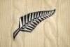 Danny Morrison. Auckland & New Zealand 1985-1997. Original New Zealand woollen sleeveless sweater worn by Morrison during his playing career, probably late 1980s. The sweater with New Zealand colours of black and white to neck and waist. Silver fern emble - 4