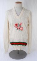 Ian Botham. Hong Kong Cricket Sixes. Original long sleeve sweater with red and green colours to waist, and ornate red and green dragon emblem to front. Probably presented to Botham as far as we can see he did not play in Hong Kong. Made by Chan Ellie of H