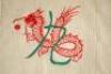 Ian Botham. Hong Kong Cricket Sixes. Original long sleeve sweater with red and green colours to waist, and ornate red and green dragon emblem to front. Probably presented to Botham as far as we can see he did not play in Hong Kong. Made by Chan Ellie of H - 4