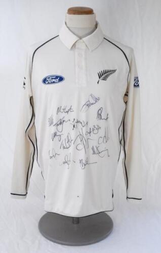 New Zealand 2015. Long sleeve replica white New Zealand Test shirt by &lsquo;Canterbury&rsquo;, size &lsquo;L&rsquo;. Signed to the chest by fifteen members of the 2015 New Zealand touring party including Brendon McCullum, Trent Boult, Ross Taylor, Kane Williamson, Tom Latham, M