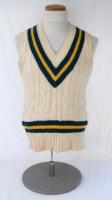 Pakistan. Original short sleeve Test sweater with green and yellow colours of Pakistan to neck and waist. The sweater by Bill Edwards of Swansea. Player unknown. From the collection of Ian Botham. Very good condition.