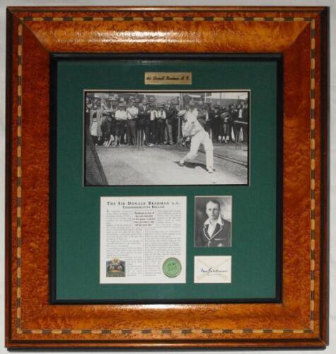 Don Bradman. &lsquo;Commemorative Release&rsquo; comprising mono copy photographs of Bradman in the nets at Perth, 1930, and head and shoulders portrait, window mounted with a printed biography and ink signature of Bradman, signed in later years. Published by the Bra