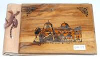 Test cricketers autograph album 1940s-2000s. Autograph album bound in wooden boards with decorative scene of Jerusalem to front. Approx. one hundred signatures of Test cricketers signed to pages by team titled in pencil. The odd signature on white label l