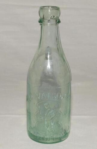 Cricket bottle. Attractive early cricket ginger beer bottle with ‘N.B.D. Watson & Co, Richmond’ with figure of a batsman and ball to the side of the bottle. Approx 8” tall. Odd minor faults otherwise in good condition.