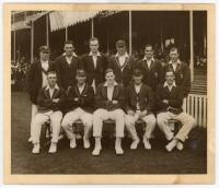 The Ashes. England v Australia 1926. Original mono photograph of the England team seated and standing in rows at The Oval wearing cricket attire and blazers, the pavilion and spectators in the background. Players are Chapman (Captain), Hobbs, Rhodes, Wool