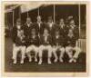 The Ashes. England v Australia 1926. Original mono photograph of the England team seated and standing in rows at The Oval wearing cricket attire and blazers, the pavilion and spectators in the background. Players are Chapman (Captain), Hobbs, Rhodes, Wool