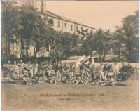 Australia tour to England and South Africa 1921. Original large mono photograph taken on the South Africa leg of the tour at Durban, dated November 1921. The image depicts members of the Australian touring party posing in the ‘Rickshaw Group’ in Durban, s