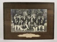 ‘New Zealand Cricket Team. Australian Tour, 1913-1914’. Excellent and rare large original mono photograph of the New Zealand touring party seated and standing in rows wearing cricket attire and tour blazers. The image, by an unknown photographer, is set i