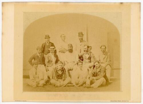 Gloucestershire County Cricket Team 1878. Original and early sepia photograph of the Gloucestershire players seated and standing in rows wearing cricket attire and assorted blazers and headgear. Players featured include W.G. Grace, James Cranston, Charles