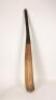 A mid eighteenth century circa 1740-1750 cricket bat of light wood, possibly willow, with right-handed curve and distinctive hook-shape to base, no shoulders, made by William Pett of Sevenoaks with two impressed marks ‘W. Pett 4’ on top of handle and ‘Wil - 2