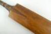 Aquila Clapshaw cricket bat 1877. An early cricket bat made by Clapshaw and exported to Australia The bat is typical of this period, the blasde is slim and the back almost flat at the top, becoming slightly humpted as it reaches the toe. The handle made f