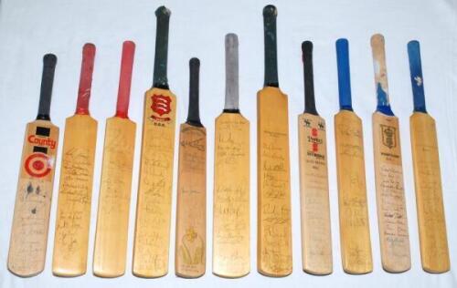 County miniature cricket bats 1980-2001. Box comprising a selection of miniature bats signed by County teams. Counties are Derbyshire 2000, Durham c.1990, Essex 2001, Glamorgan 1980, 1991, c.2000 & 2001, Hampshire c.1900 and 2001, Leicestershire 2001, Mid