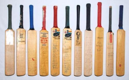 Test team miniature cricket bats 1957-2002. Box comprising a selection of miniature bats signed by Test and touring teams including England 1957, 1980, 2000 (2 different), 2002 (2), South Africa 1983/84, 1996, Sri Lanka 2002, West Indies 1988, Zimbabwe 20