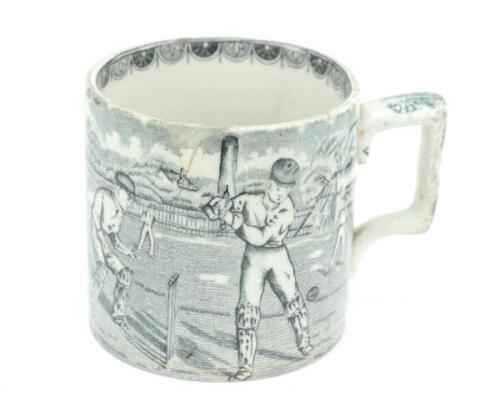 Staffordshire sporting mug. Victorian Staffordshire jug with strap handle, transfer printed in black, with a cricket scene of batsman, wicket-keeper and two fielders with pavilion and trees to background. To verso, a football scene involving four players 