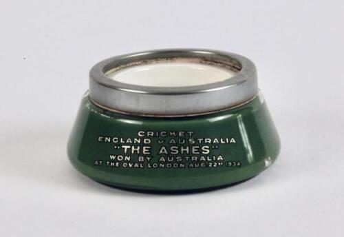 Don Bradman. Australian tour of England 1934. Green glass and ceramic ashtray with chrome metal band to top, made to commemorate Australia winning the Ashes series at The Oval in August 1934. The ashtray made in Stourbridge was made and presented to Don B