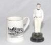 ‘Pavilion Trent Bridge Cricket Ground’. Rarer design Sandland tankard with transfer print of the pavilion at Trent Bridge to side. Gold lustre to rim. Approx. 4” tall. Sold with a china figure of William Clarke in cricket attire. To base ‘William Clarke. 