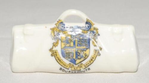 Cricket bags. Three small crested china cricket bags with colour emblems for ‘Bournemouth’, ‘Great Yarmouth’ and ‘Sandy’. Each approx 3.25” long. All Arcadian China. G.