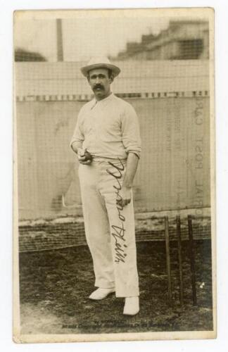 William Peter ‘Bill’ Howell. New South Wales & Australia 1894-1905. Original mono real photograph postcard of Howell standing full length in the nets, wearing cricket attire and holding a ball. Very nicely signed in black ink to the photograph by Howell. 