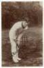 Arthur William ‘Dave’ Nourse. Natal, Transvaal, Western Province & South Africa 1896-1936. Excellent sepia real photograph postcard of Nourse, full length, in batting pose at the wicket, wearing a 1912 South Africa tour cap for the Triangular Tournament h