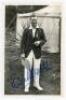 Eric Londesbrough Dalton. Natal & South Africa, 1924-1947. Very nice mono real photograph postcard of Dalton standing full length in front of a marquee, wearing cricket attire and South Africa tour blazer, presumably on the 1929 tour to England. The postc