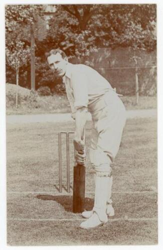 Robert McKenzie Carlin. Derbyshire 1905-1908. Early sepia real photograph postcard of Carlin, full length at the wicket in batting pose. Blind embossed stamp for Foster of Brighton to lower right corner. Postally unused. Slight indentations and creasing t