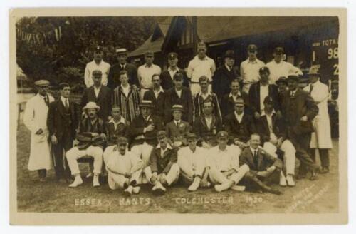 ‘Essex v Hants, Colchester 1920’. Sepia real photograph postcard of the Essex and Hampshire teams seated and standing in rows wearing cricket attire and assorted blazers and caps, in front of the pavilion. Taken at the match played at Colchester, 19th- 22